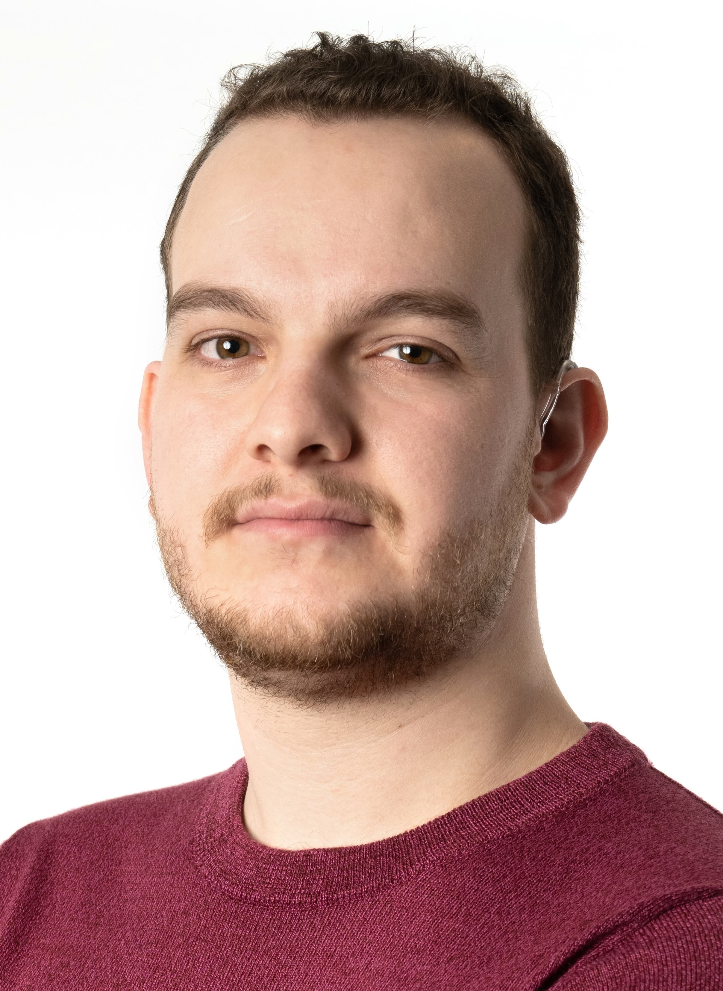Headshot of Abraham Glasser. He has light skin and brown hair.